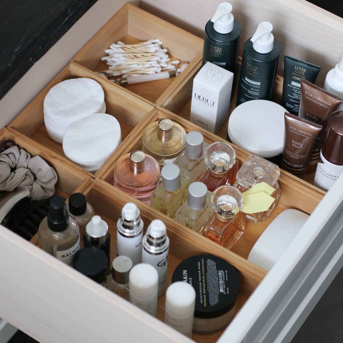 Bamboo organizer in bathroom drawer