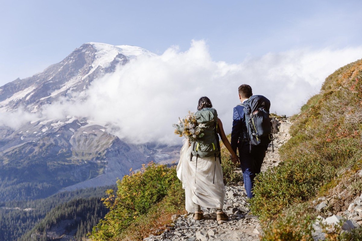 Hiking couple during adventure elopement