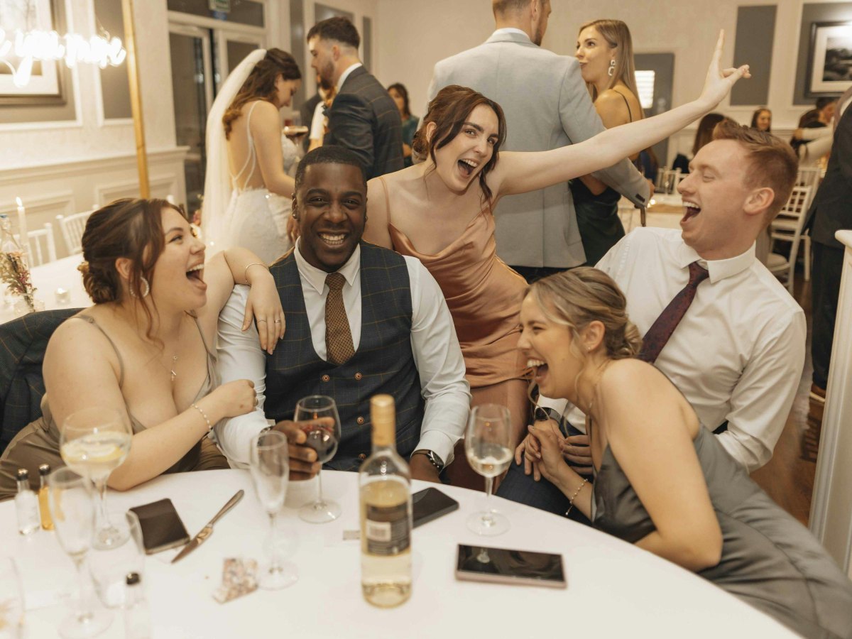 Close friends at wedding reception
