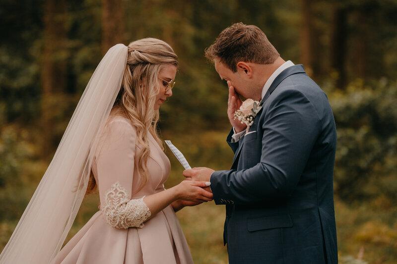 Emotional couple during wedding vows