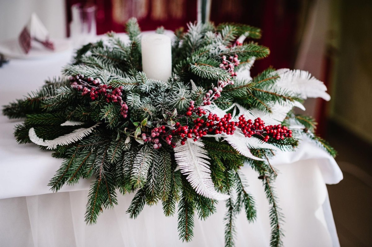 Frosted berries greenery winter centerpiece