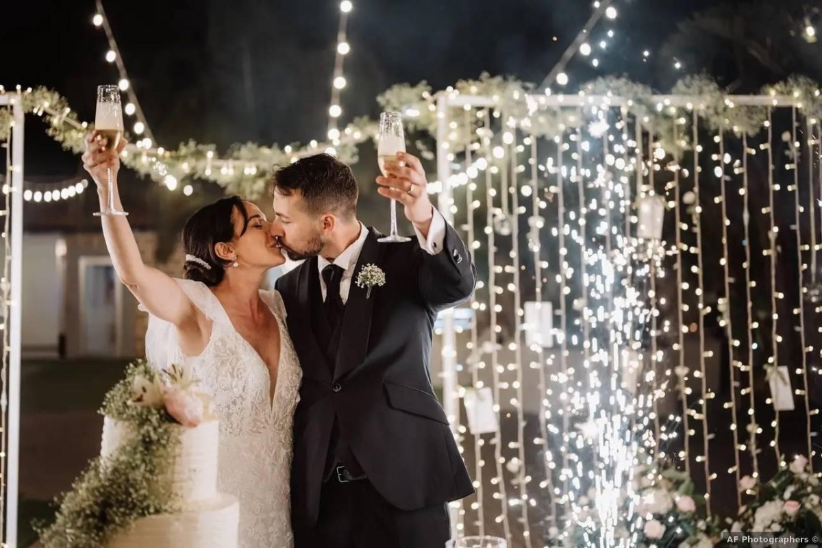 Couple celebrating final wedding toast