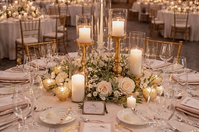 Gold accented winter wedding centerpiece