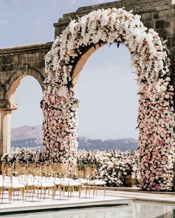 Luxury wedding arch with statement flowers