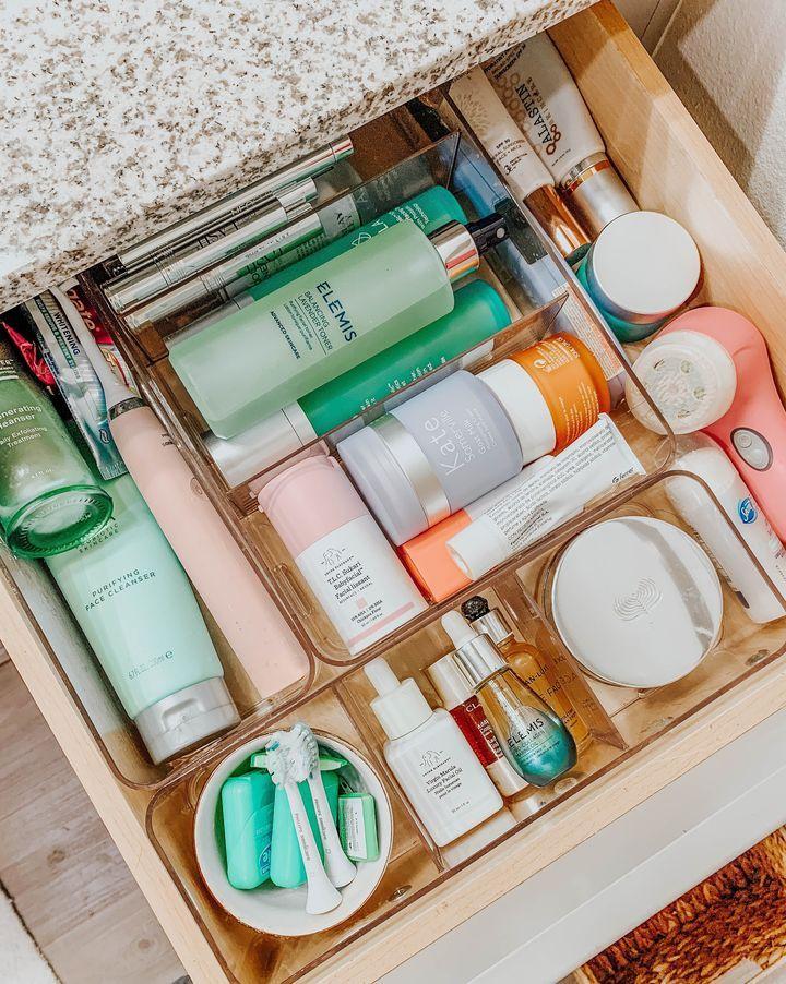 Skincare products organized in bathroom drawer