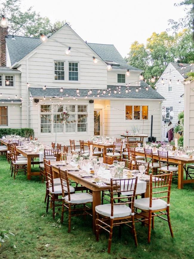 Backyard courthouse wedding reception with lights