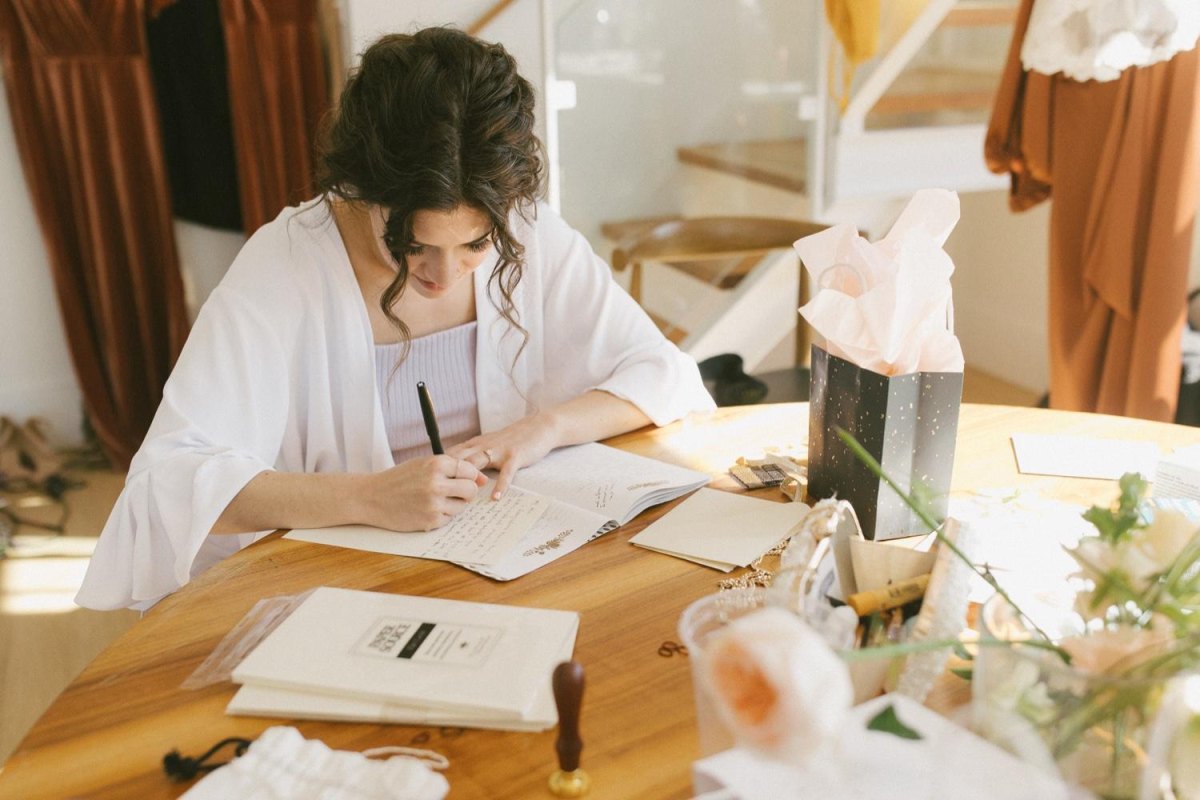 Woman writing wedding speech notes
