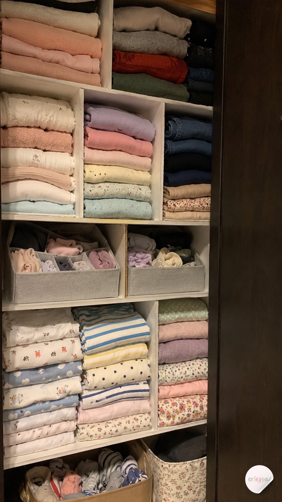 A rod-end jewelry organizer board hangs necklaces tangle-free, a clever small closet organization idea.