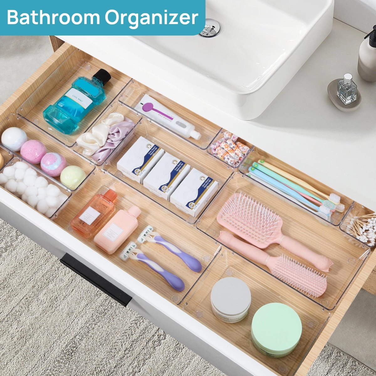 Clear containers inside bathroom drawer