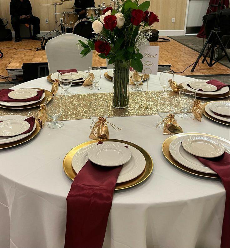 Burgundy gold wedding reception